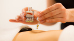 Wellness-Anwendung Hot-stone-Massage mit vorherigem Einölen